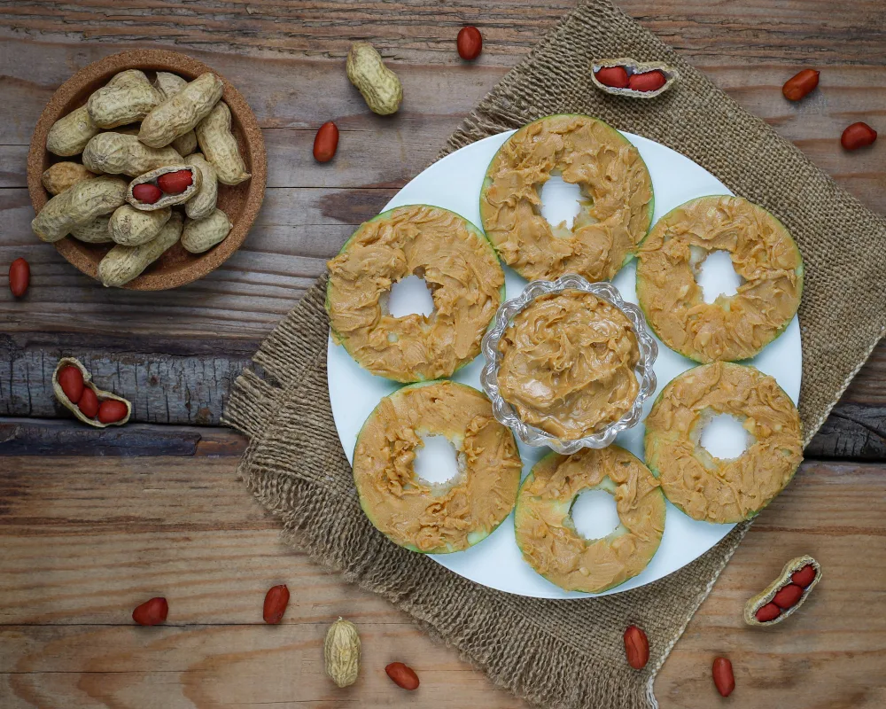 Freshly baked homemade peanut butter dog biscuits on a tray